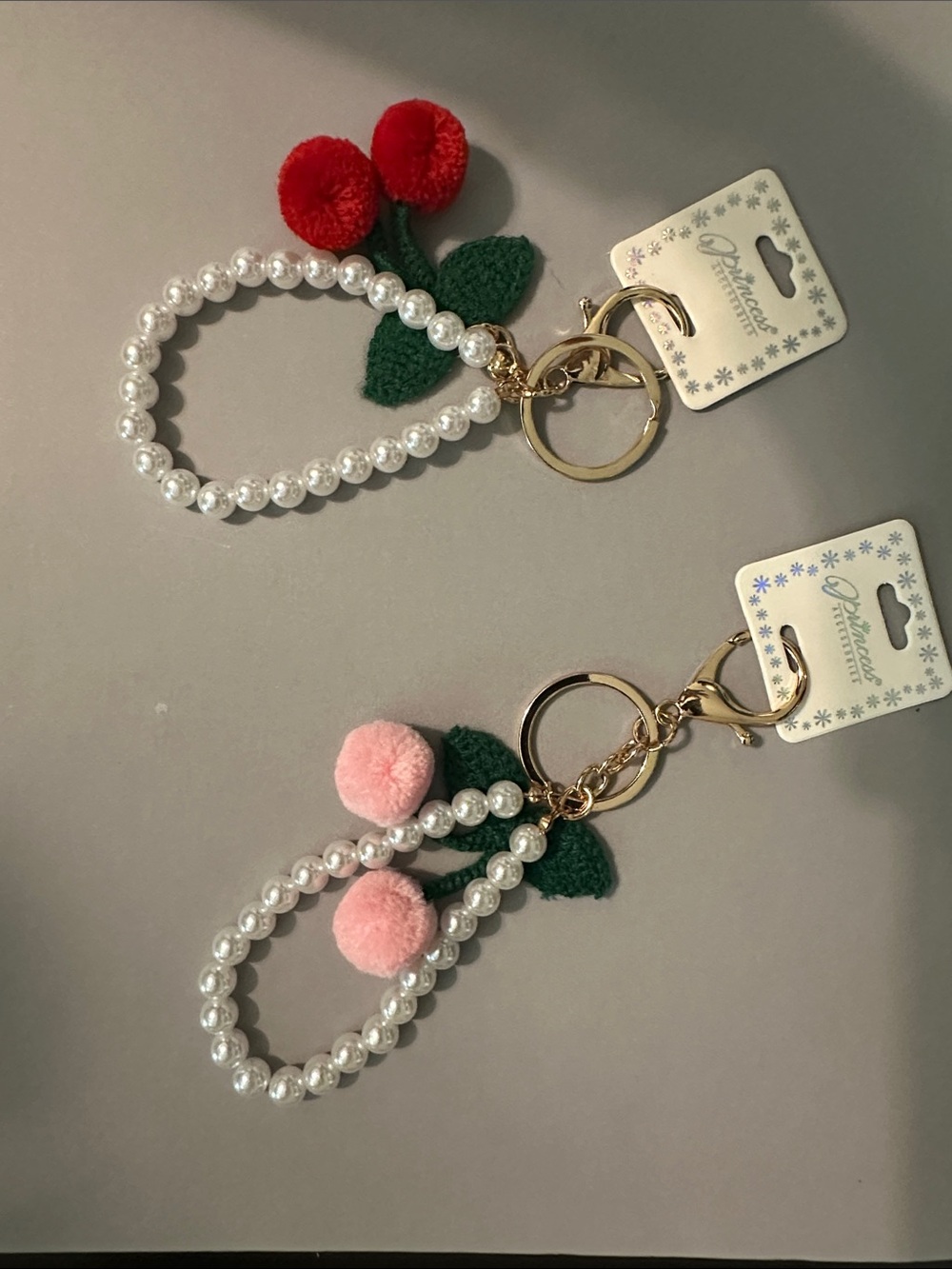 Pearl Loop Cherry Keyring with Red or Pink Pom Accents